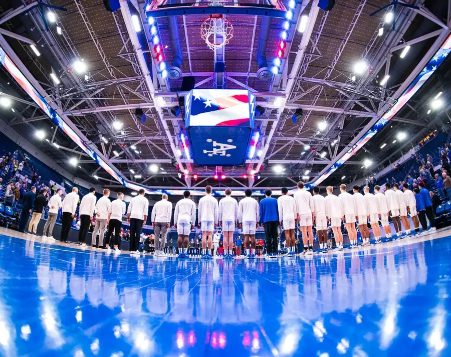 basketball players lined up on court