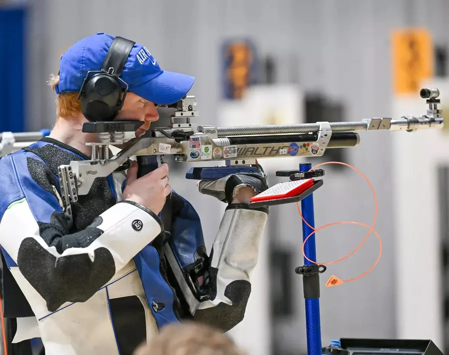 athlete shooting a gun