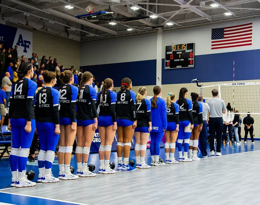 athletes lined up on court