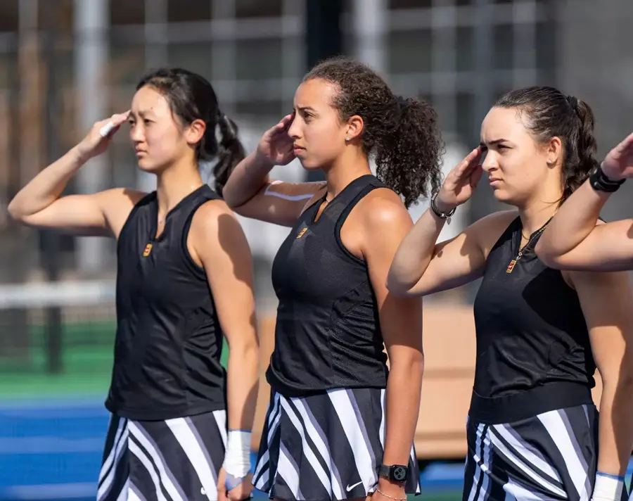 athletes saluting