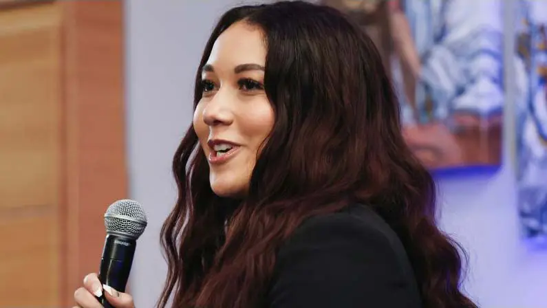 women talking into mic