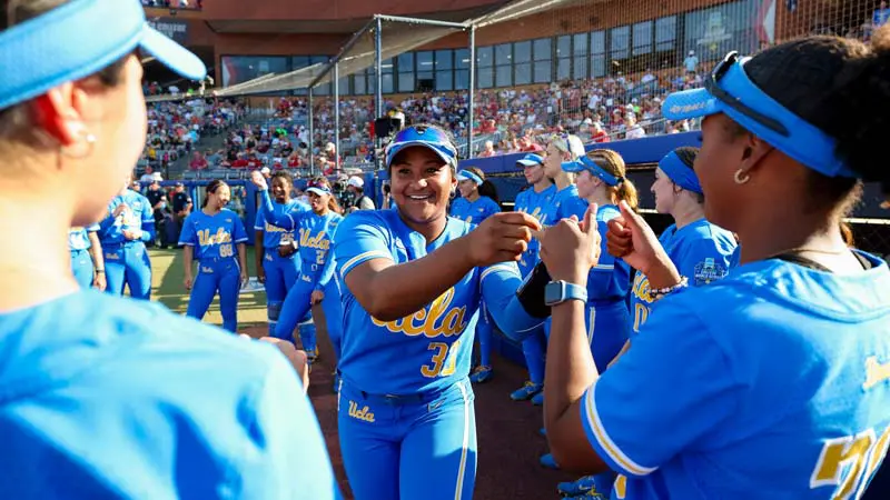 Softball team celebrating